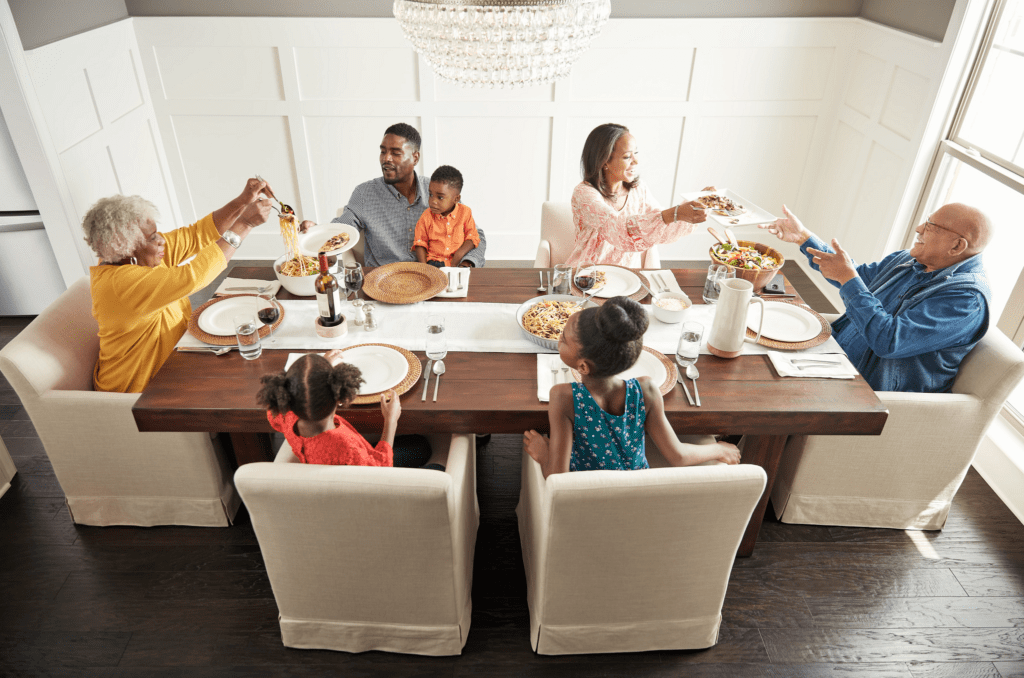 Family having breakfast at the dining table | Sackett's Flooring Solutions